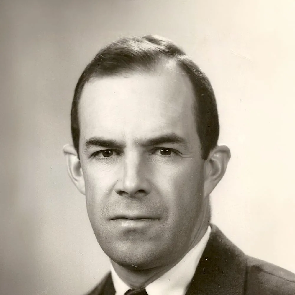 Studio portrait of Headmaster David Twichell, who put the first coeducation proposal before the Trustees in 1957