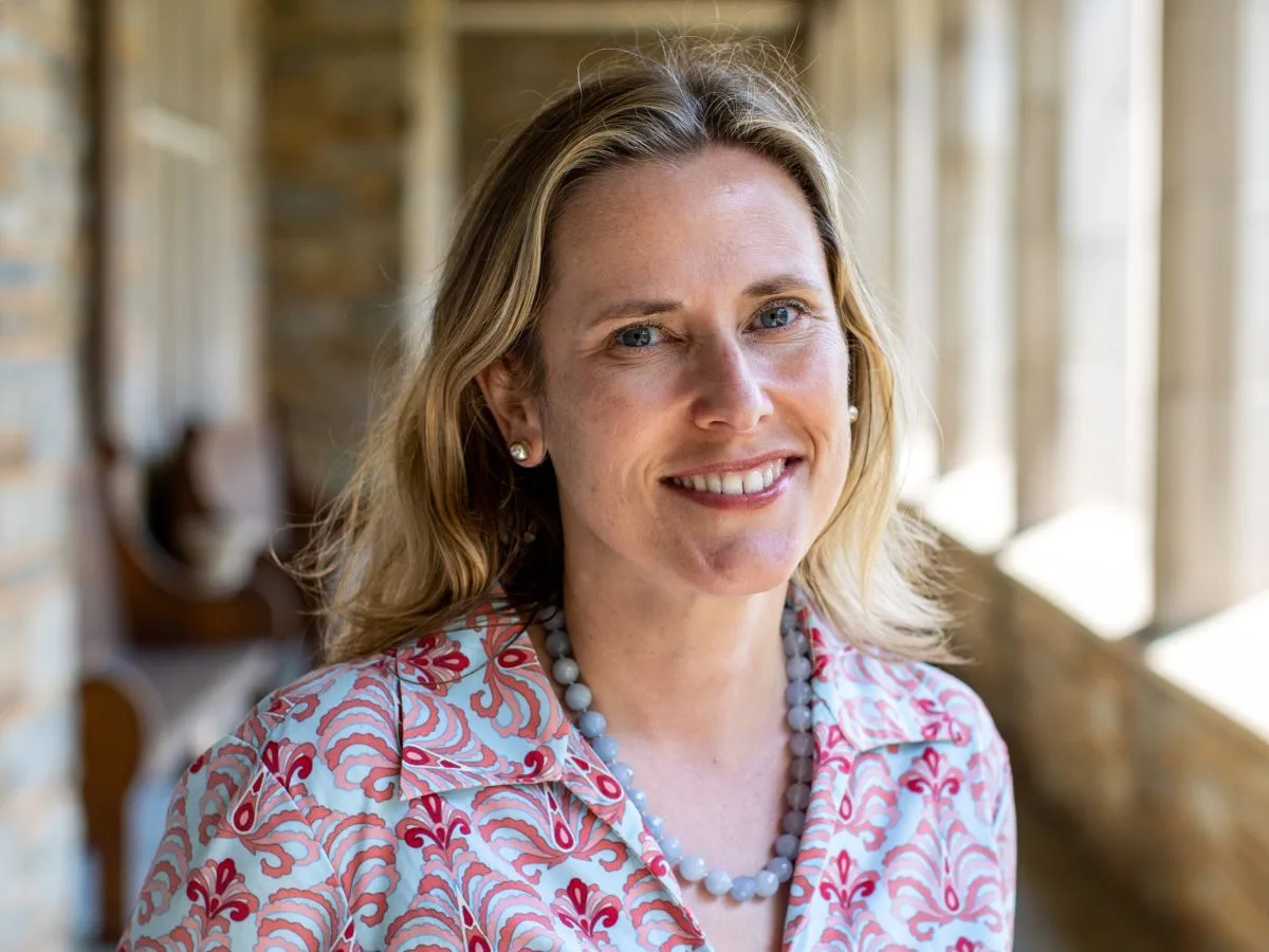 Heather Willis Daly, Pomfret's thirteenth Head of School and the first woman to hold the position, photographed in a campus cloister